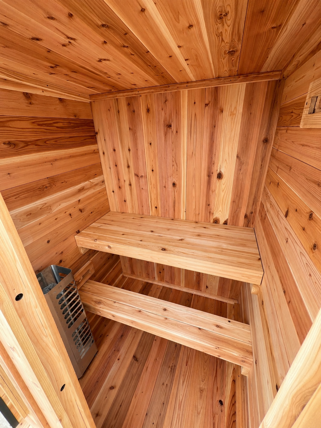 Cedar interior corner of The Ridge with the bench and heater area visible