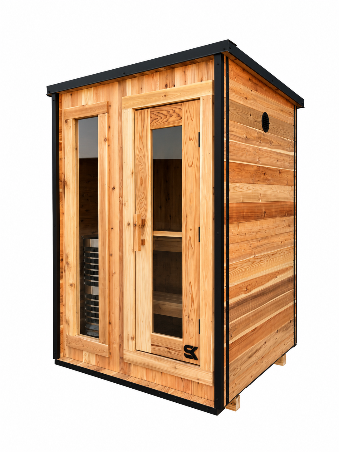 The Ridge outdoor sauna seen from the front corner, showing the pitched roofline, black steel trim and cedar siding